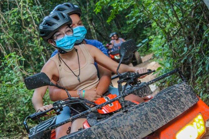 5-Hour Guided Atv Ziplines and Cenote Experience in Puerto Morelos - ATV riding through the jungle