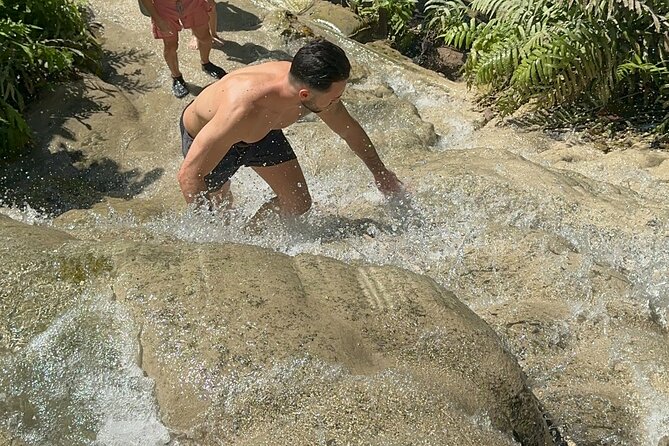 7 Hour Sticky Waterfall and Zipline Adventure - Cooling off with a full Thai lunch