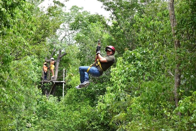 Adrenaline Tour with ATV, Zipline, and Cenote from Cancun - Swimming in the cenote near Puerto Morelos