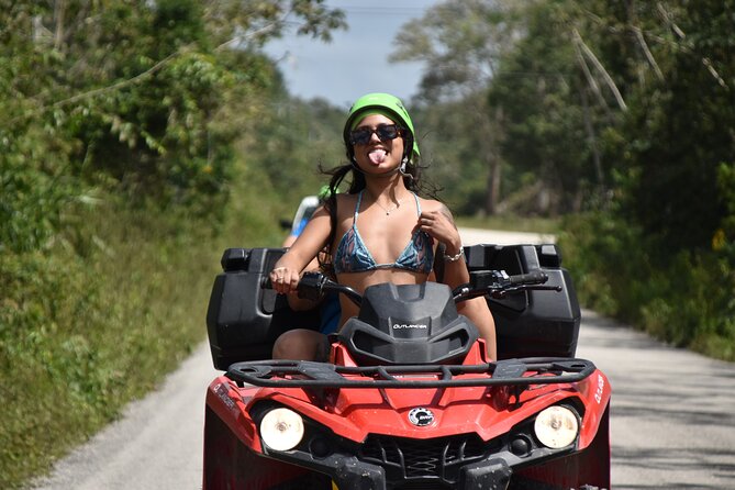 Adrenaline Tour with ATV, Ziplines and Cenote from Cancun - ATV riding through the jungle
