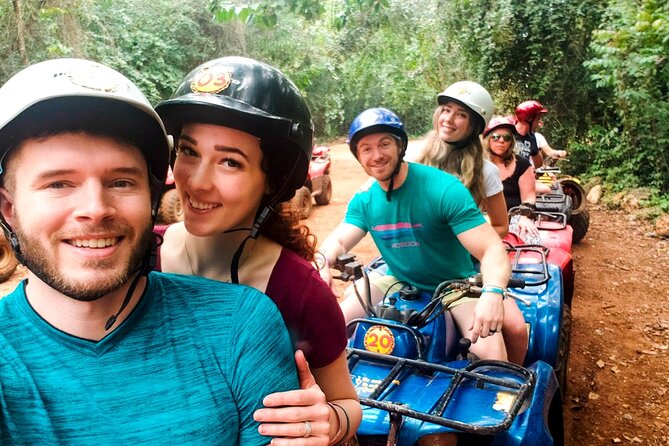 Amazing ATV (single) Cenote and Ziplines with Transfer from Playa del Carmen - Cooling off in a semi-open cenote