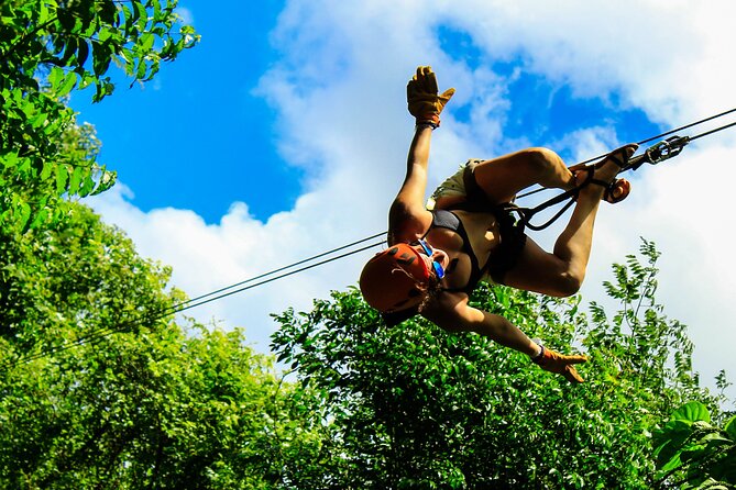 Amazing ATV Tour, Ziplines and Cenote Swim with Lunch and round trip included - ATV riding on rough jungle roads