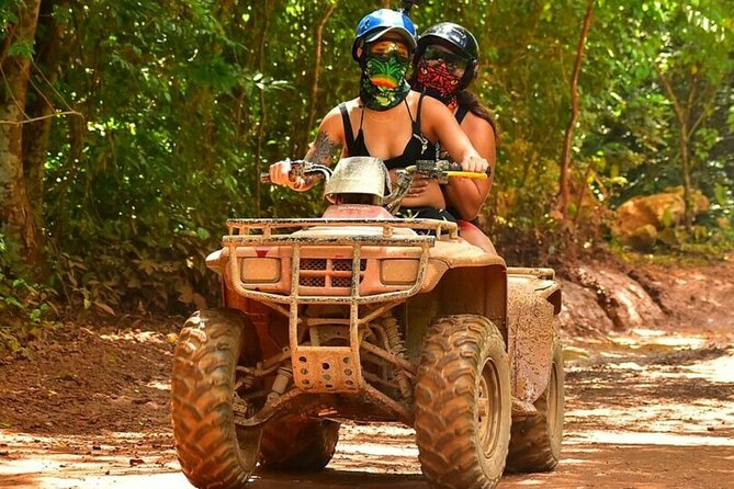 Amazing ATV with Zip Lines and Swim in Cenote with Round Transportation - Cooling off in a natural cenote
