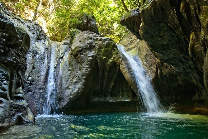 Amber cove and Taino Bay 7 Waterfall Zip lined & Dominican food - Jumping, sliding, and swimming down the seven falls