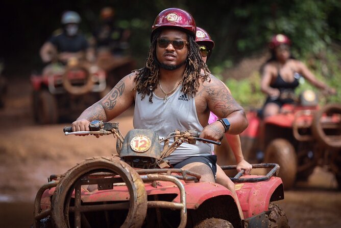 ATV adventure with cenote, ziplines, snack and transport from Cancun or Riviera - Riding the ATV circuit through the jungle
