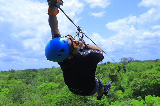 ATV adventure, Ziplines, Cenote Swim, Snack & Transport Included. - Swimming in the sacred cenote