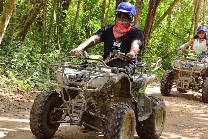 ATV Cenote and Zipline Sacred Jungle Expedition - Cooling off inside the cenote