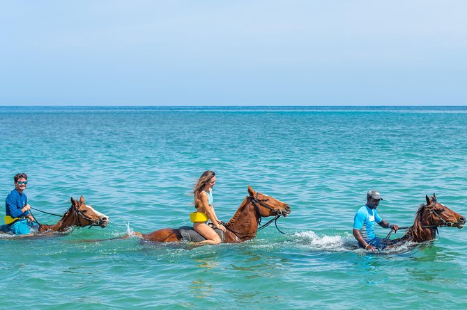 ATV, Horseback Ride, Zipline, Falls Climb + Lunch from Ocho Rios - Ziplining above the waterfall