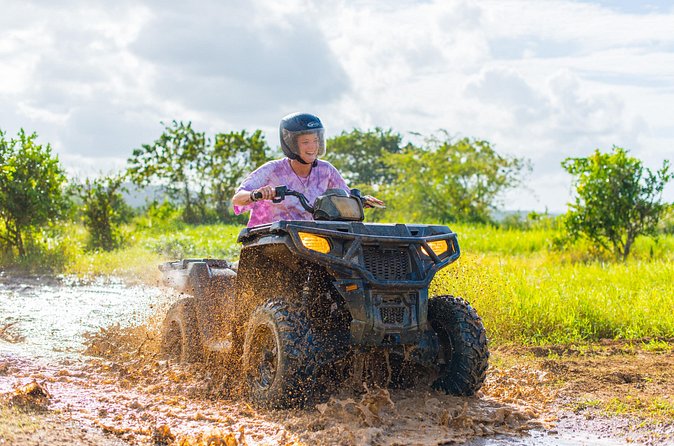 ATV, Horseback Ride, Zipline, Falls Climb + Lunch from Ocho Rios - ATV riding on Jamaican dirt trails