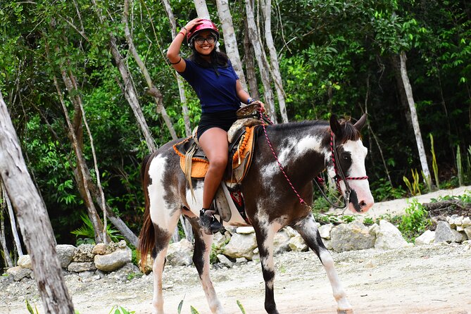 ATV (shared), Horse Back Riding, Ziplines, & Cenote from Cancún - Crossing the treetops on ziplines