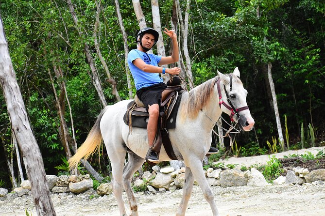 ATV (shared), Horse Back Riding, Ziplines, & Cenote from Cancún - Cooling off in a semi-open cenote
