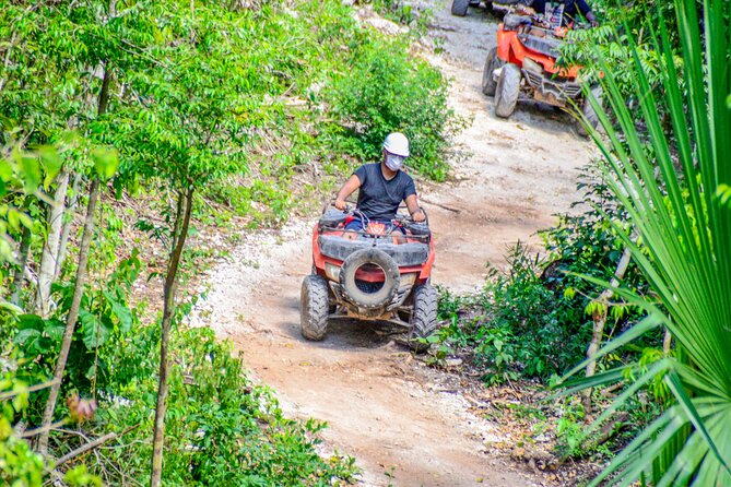 ATV Tour, Ziplines and Cenote with Lunch and Transportation - Leaving Cancun for the jungle circuit