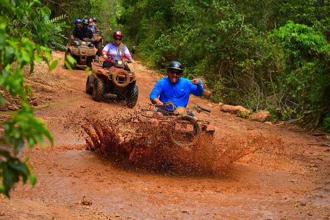 Awesome ATV experience in the jungle with cenote swim and ziplines included - Ziplining Above the Trees