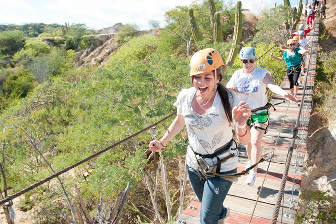 Cabo Zip-line and Rappelling Adventure - The suspension bridge and rappel add real variety