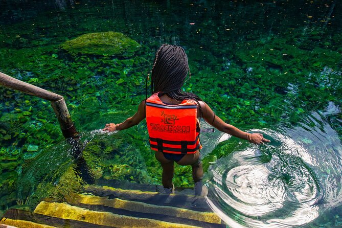 Cenote Tankah and Mayan Village Tour with Zipline, Canoes & Lunch - Zip lines above the jungle