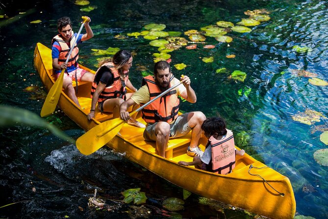 Cenote Tankah and Mayan Village Tour with Zipline, Canoes & Lunch - Canoeing on turquoise water