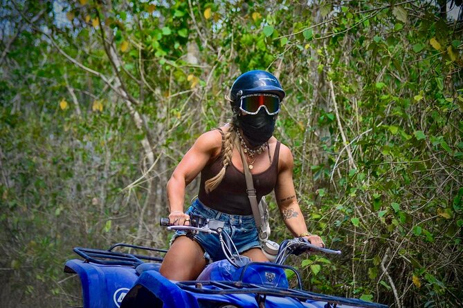 Cenotes, Caves, Ziplines and ATV Fun Tulum Adventure Tour - Riding ATVs through the jungle