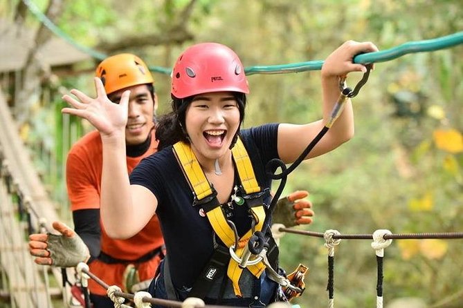 Chiang Mai Zipline White Water Rafting and Elephant Sanctuary - Ziplining above the dam and forest