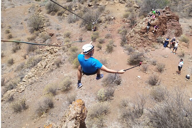 Climbing + Zipline + Via Ferrata + Cave. Adventure route in Gran Canaria - Finishing on the 50-meter zipline