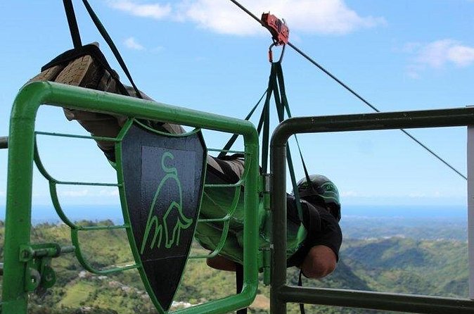 Conquer the Skies: Monster Zipline at Toro Verde Adventure Park - Crossing the suspension bridge to the launch point