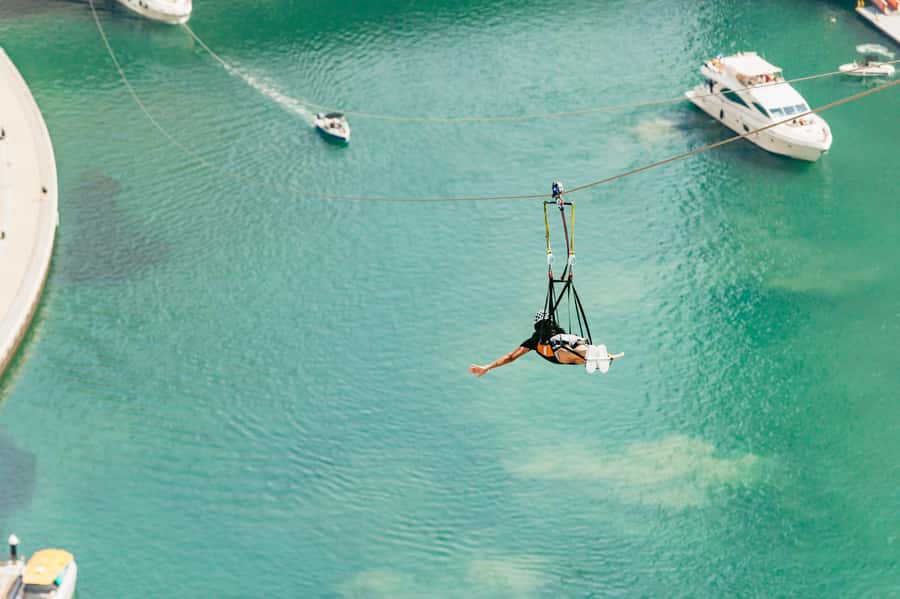 Dubai: Marina Ziplining with Photos, Video and Meal - Flying over Dubai Marina from Anwaj Towers