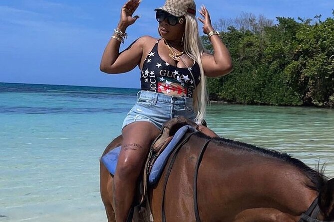 Dunn’s River Falls,Zip lining & horseback riding Combo tour from Montego Bay - Climbing Dunn’s River Falls with a trained guide