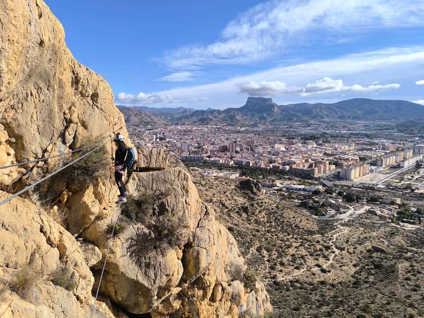 Elda: El Bolón via ferrata with zipline and abseiling - First contact with the rock on the K1 section