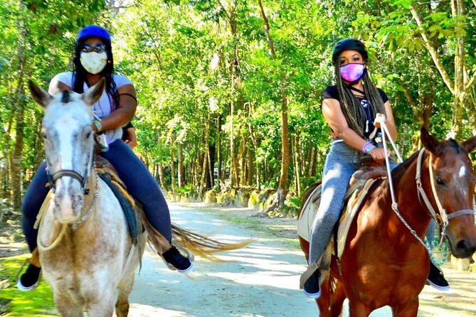 Extreme Horses Adventure with ATV, Ziplines & Cenote - Stop one: a calm horseback ride at El Rey Polo Country Club