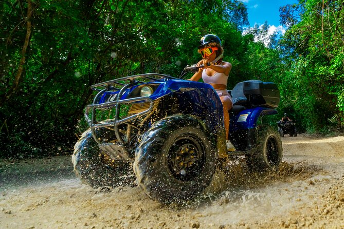 From Playa del Carmen ATV Adventure with Ziplines, Cenote - ATV riding on a guided jungle route