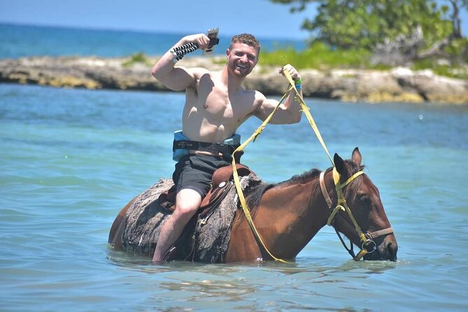 Full Day Private ATV with Zipline and Horseback Riding in Negril - One big Jamaican day, from dirt tracks to sea water