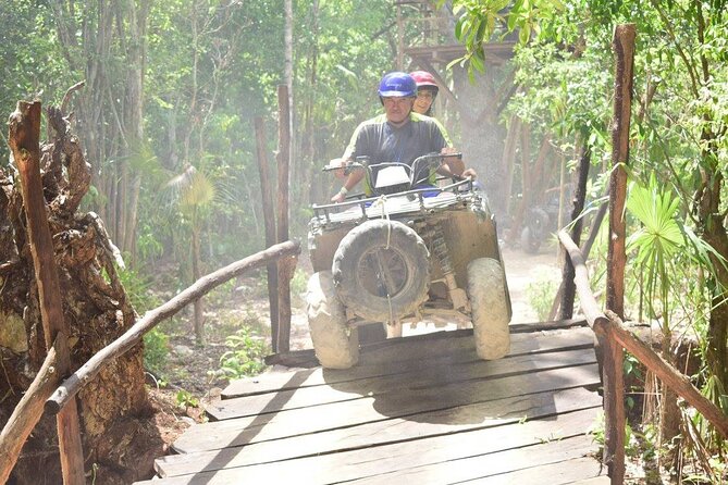 Half Day ATV, Zip-line & Cenote tour! Transportation from Cancun - Riding a shared ATV through the jungle