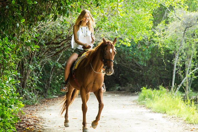 Horseback Riding + ATV + Cenote + Zip-Line from Cancun and Playa del Carmen - ATV riding on the ranch trails