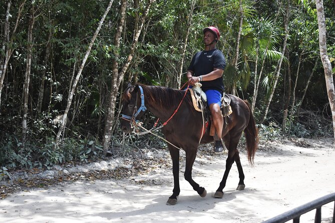 Horseback riding Tour with ATV circuit, ziplines and Cenote - ATV riding through the jungle
