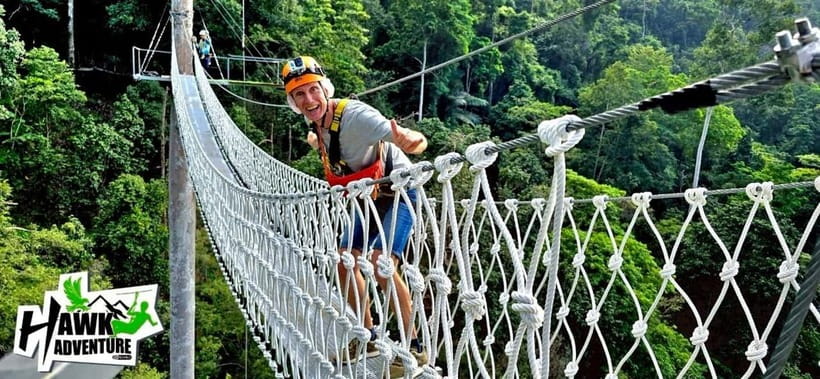 Koh Samui: Zipline Adventure with Hotel Transfer - A sky walkway, staircase corridor, and jungle pauses