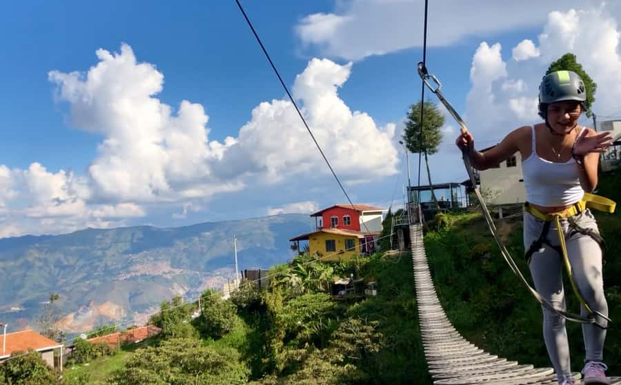 Medellin: Day Trip to Private Zipline and Waterfall Trek - The river crossing and the 70-meter rock wall