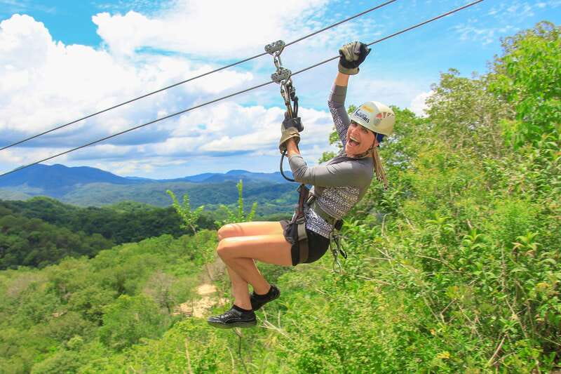 Outdoor Zipline Adventure - Waterfall rappelling is the day’s boldest moment
