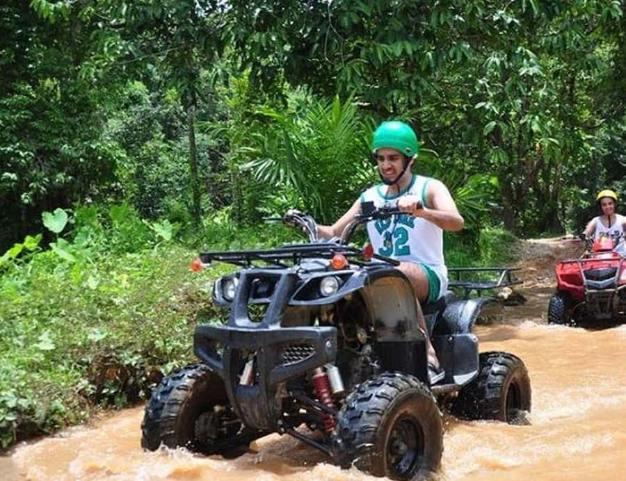 Phuket ATV Bike with ZipLine Adventure Tours - Moving from mud to the 33-platform zipline course