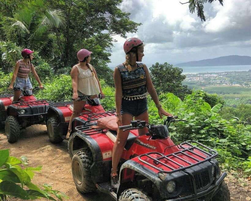 Phuket: Big Buddha Viewpoint ATV Tour and Zipline Adventure - Riding an ATV through the rubber trees
