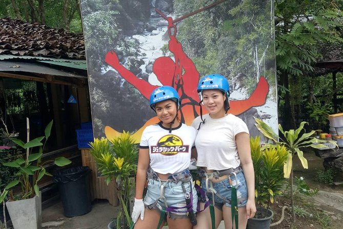 Private Chiang Mai Tour to Bua Thong Waterfalls and Ziplining - Visiting the Karen Long Neck Village
