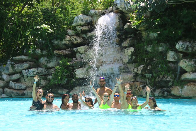 Punta Cana Ziplines, Hanging Bridge, and Waterfall Pool Adventure - Rice, Beans, Chicken, and Criolla Sauce