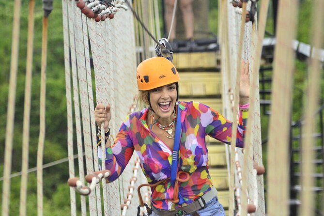 Punta Cana Ziplines, Hanging Bridge, and Waterfall Pool Adventure - Crossing the Himalayan Hanging Bridge