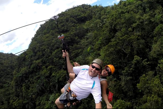 Samana Zip Line with Waterfalls & Culture Tasting - Swimming beneath the waterfall