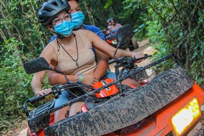 Shared ATV's and Zip Lines and Swimming in a Real Cenote. - A fast start on zip lines and hanging bridges