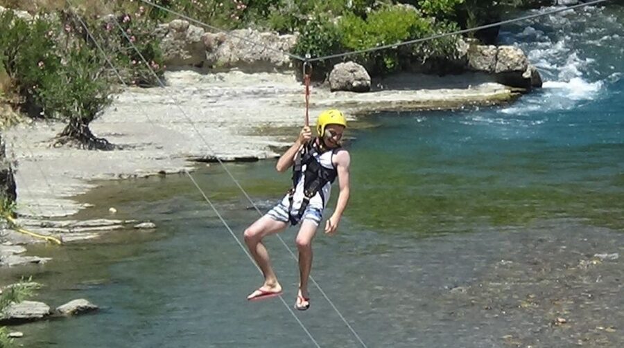 Side: Rafting and Zipline Canyon Tour with Lunch & Transfers - Getting fitted for the river
