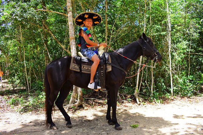 Single ATV, Ziplines, Cenote & Horse Riding from Cancun & Playa Del Carmen - Cooling off in a cenote