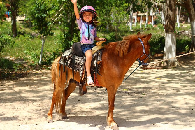 Tequila Tasting, Cenote, Horseback Riding, ATV, Ziplines & Lunch - ATV riding on the Mayan jungle route