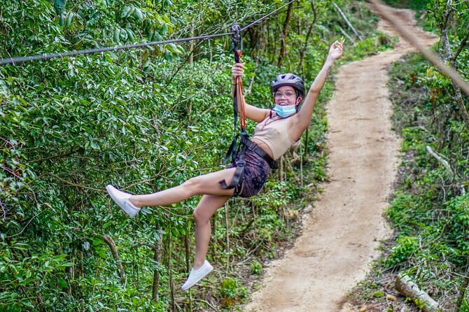The best ATV tour with ziplines and Cenote swim day! - Ziplines and hanging bridges above the trees