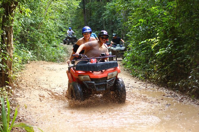 Thrills in Tulum's Jungle: Rappel, Ziplines, ATVs, Cenote & more - Swimming in a cenote and meeting local hosts