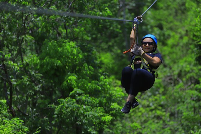 Top ATV's in Mexico includes Cenote, Ziplines, snack & transport. - Zipline lines above the trees