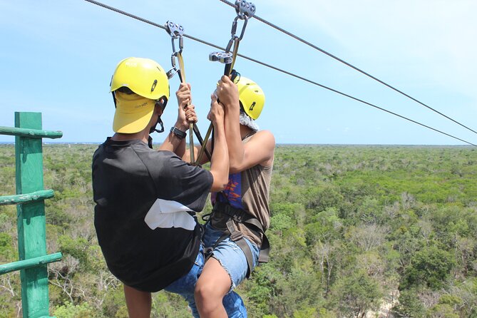 Tulum's Thrilling Jungle: ATV, Zip Lines, Cenote & More! - Rappelling 13 feet into the action